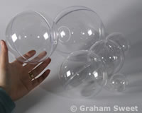 Clear plastic balls, by graham Sweet Studios, uk