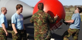 Giant red nose produced from polystyrene, for an RAF tornado jet.