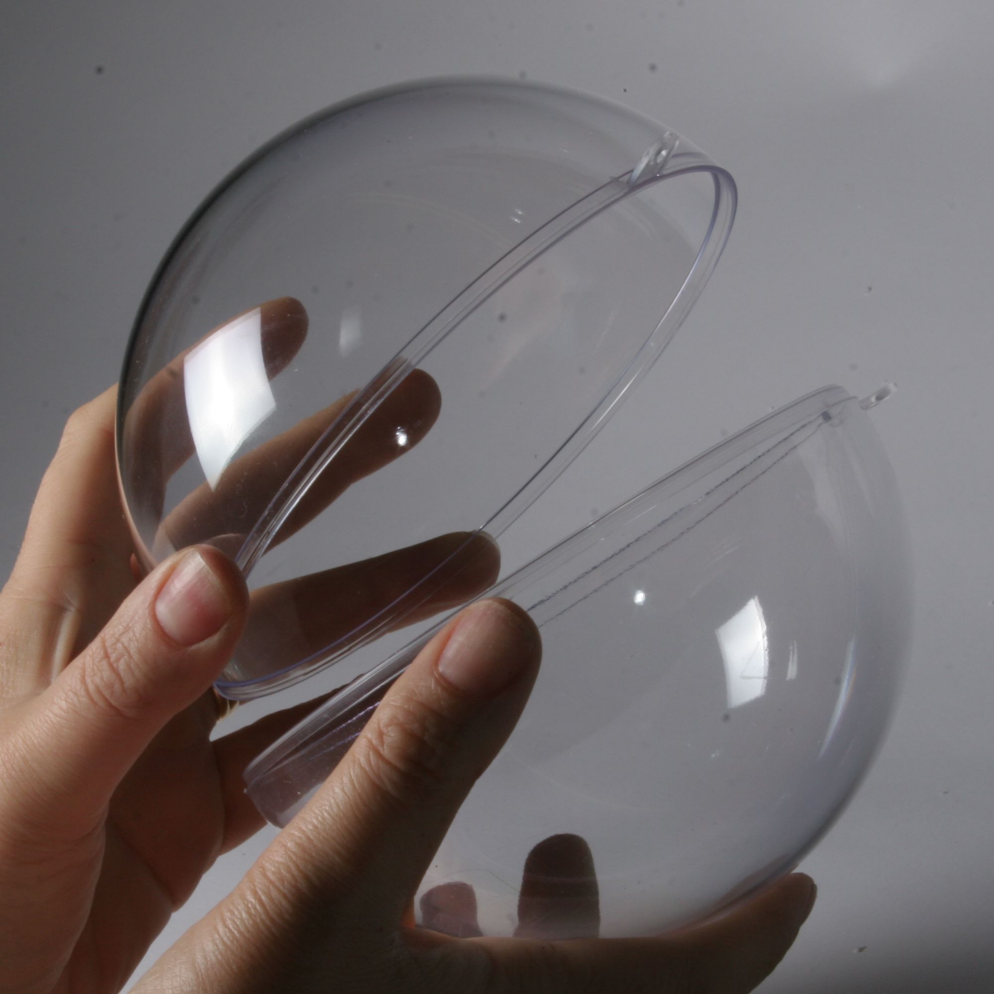 clear plastic balls supplied in two halfs