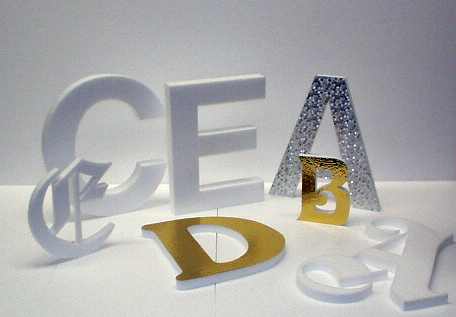 expanded polystyrene , dence foam, letters, signs, cut from polystyrene