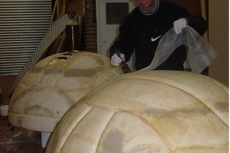 Polystyrene ball being covered with fibre glass.