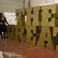 Giant Gold glittered letters.