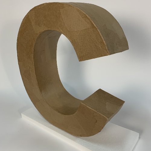 Cardboard / papier mache 3d freestanding letter shape, mounted onto an MDF base.