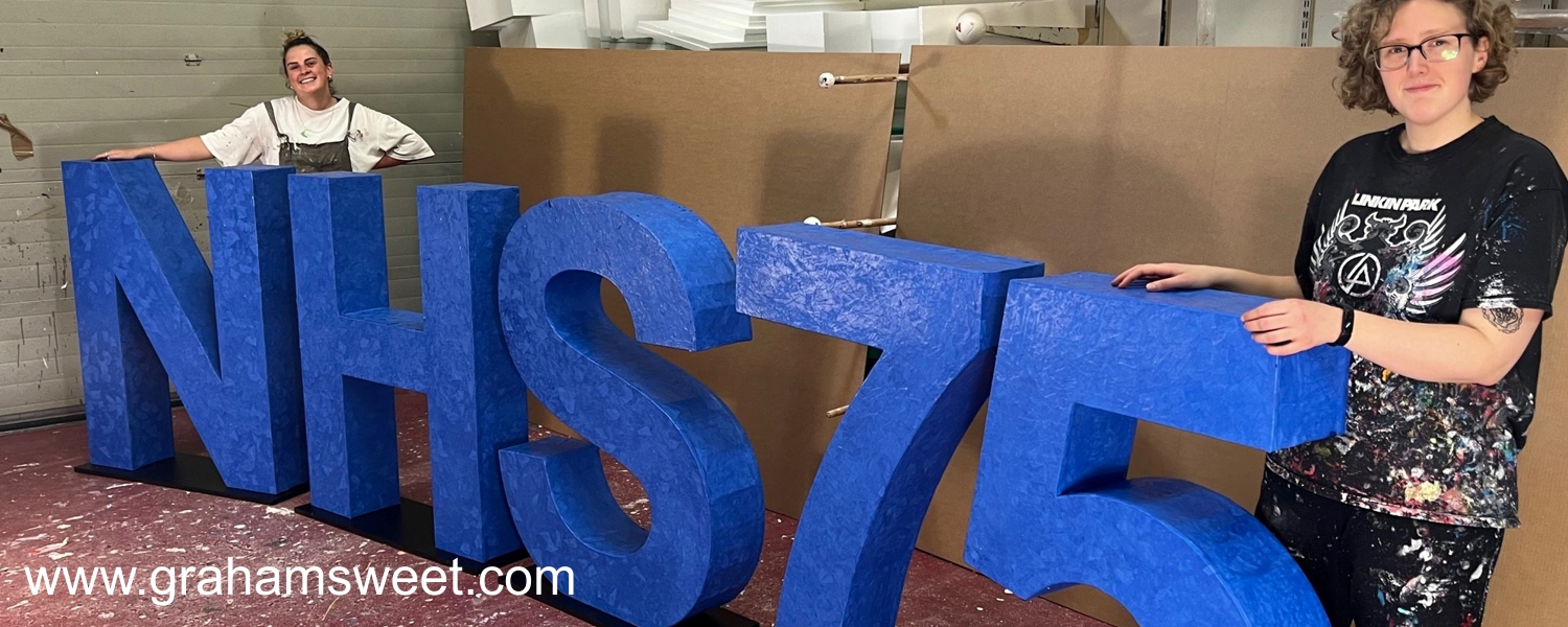 large cardboard letters produced for the NHS