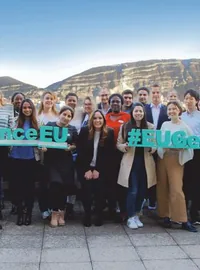 EU Business School students with branded hashtag letters
