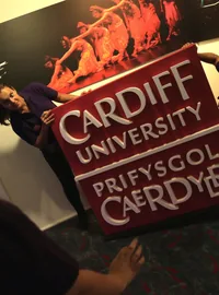 Large branded university graduation logo