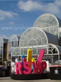 Colourful RSVP event letters outside the Business Design Centre