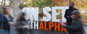 Large ON SET WITH ALPHA event logo installed outdoors