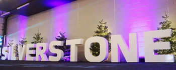 Large white SILVERSTONE letters illuminated at a festive event