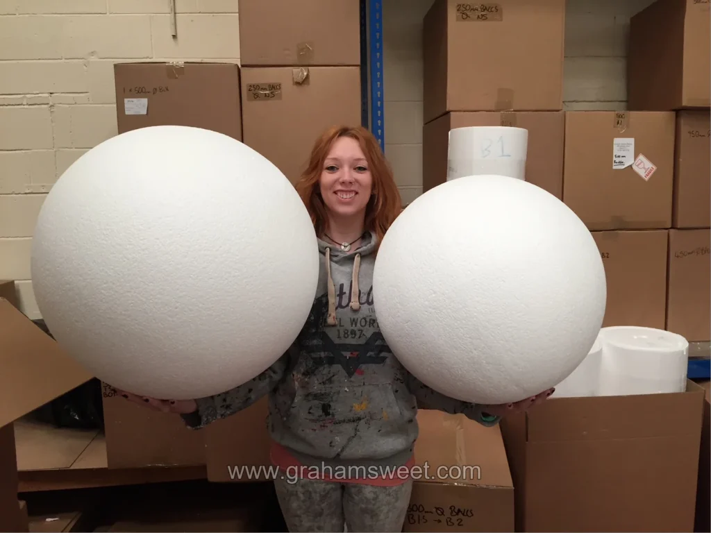 Large polystyrene balls in the Graham Sweet Studios workshop before coating and painting