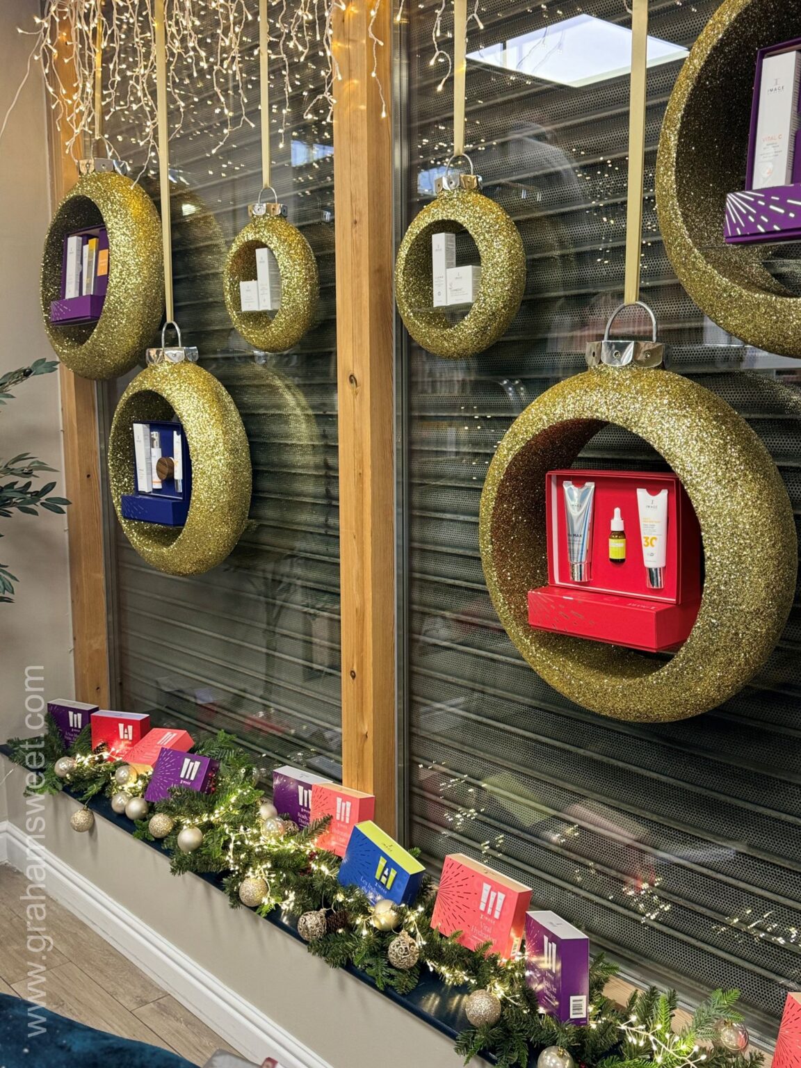 Curved VM Bauble Shelves in winning window display!