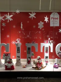 Mamas and Papas Christmas window with large GIFT letters