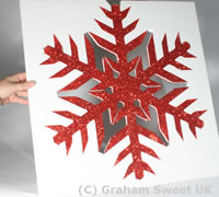 Each snowflake comes packed within a sheet of polystyrene. 