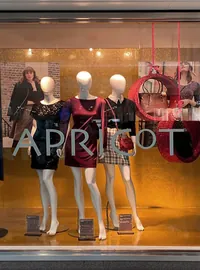 VM bauble shelves in a Beales Christmas window
