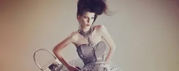 Giant silver glitter bauble in a Financial Times fashion shoot