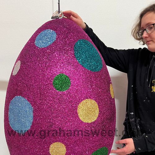 Glittered polystyrene egg - fitted with hanging point.
