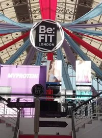 Large hanging logo for Be:Fit in the business design centre London