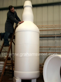 giant polystyrebne model of a bottle.