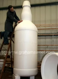 giant polystyrebne model of a bottle.