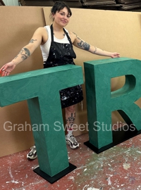 Green cardboard letters manufactured for exhibition and display use