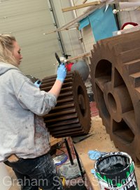 Oversized cog props manufactured for exhibition stand displays