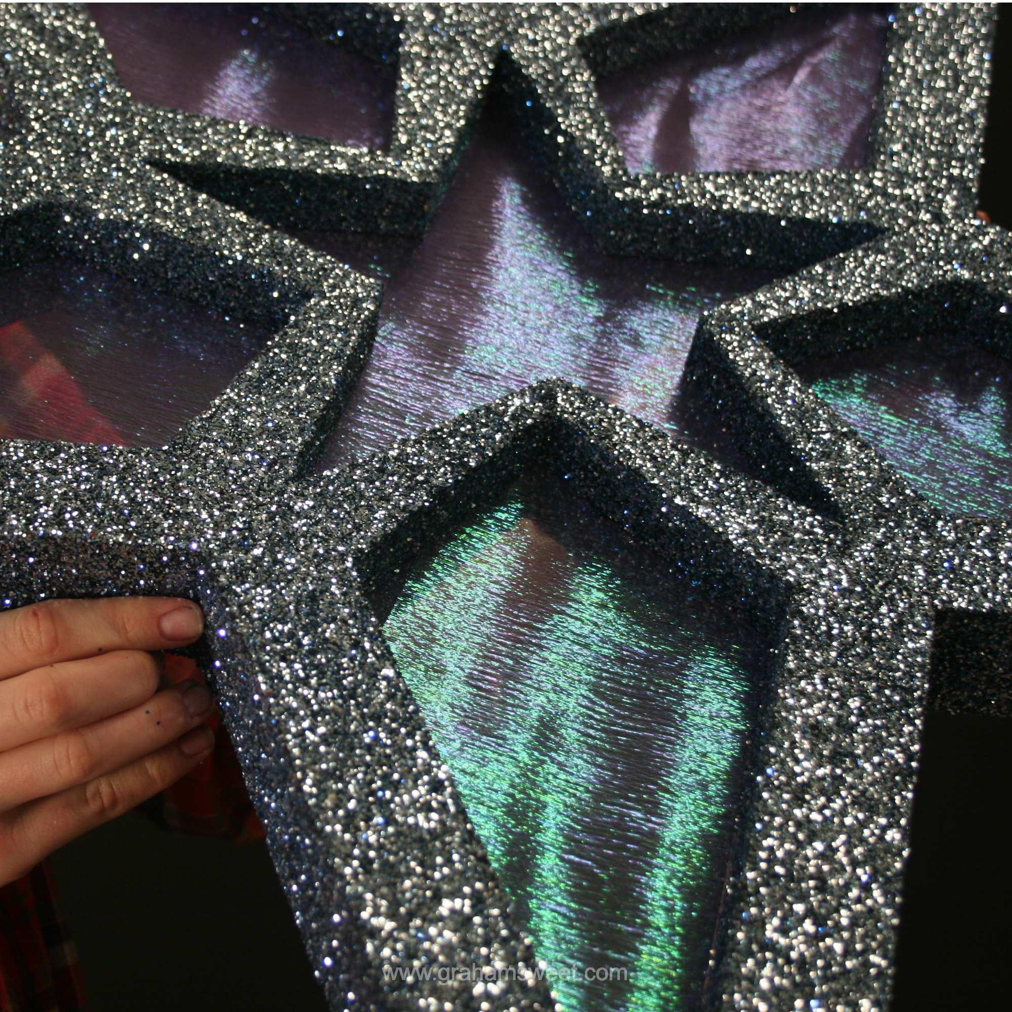 close up of glittered star and fabric center sections