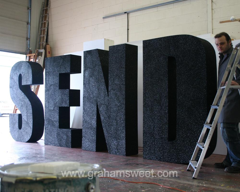 1800mm high polystyrene letters - covered in black glitter