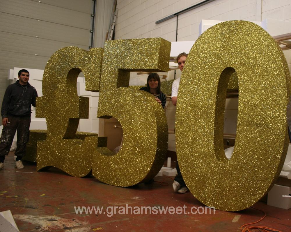 2m high polystyrene 50 - covered in gold glitter