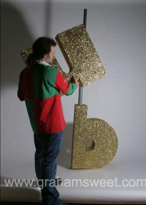 gold glittered polystyrene letters