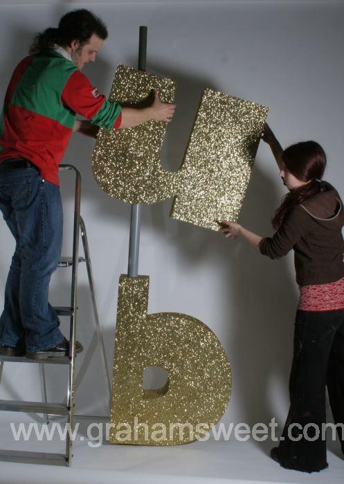 gold glittered polystyrene letters