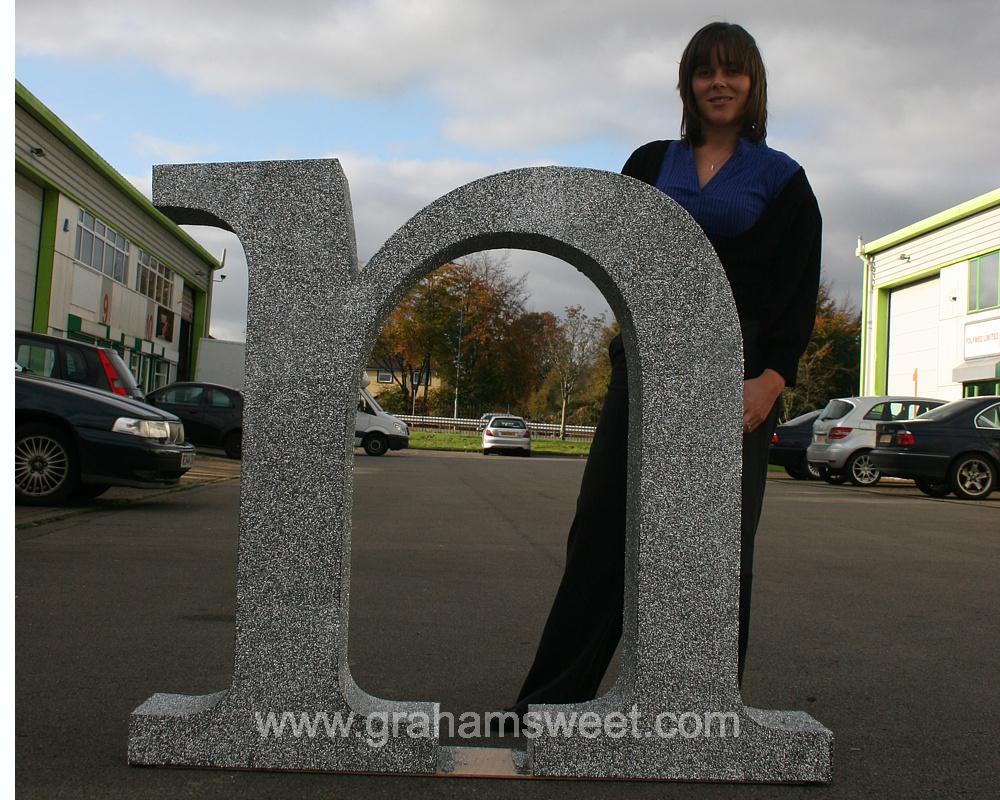 polystyrene n - covered in silver glitter