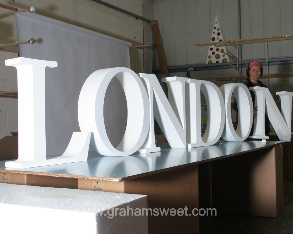 1800mm high polystyrene letters - covered in black glitter