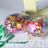 large and small clear plastic filled eggs