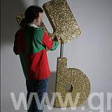 gold glittered polystyrene letters