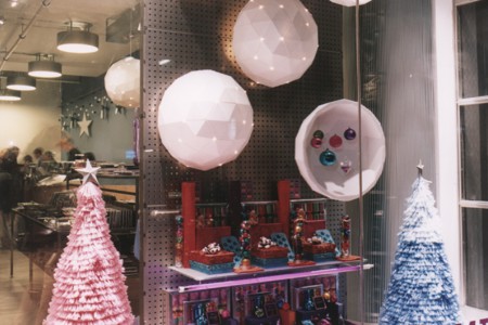 Polystyrene hollow balls in the fron window of paperchase london.