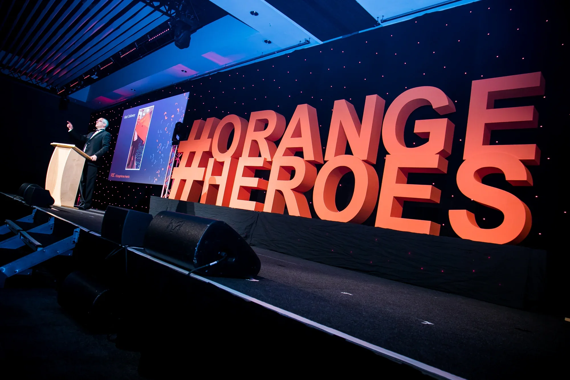 Large Orange Heroes conference letters
