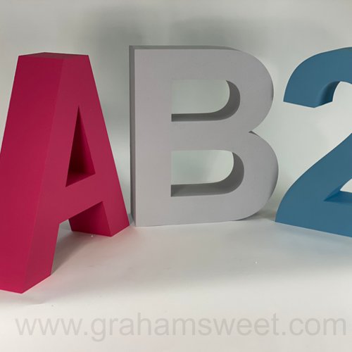 500 mm high polystyrene letters - Arial Bold ;  Painted ( colour TBC - send code )