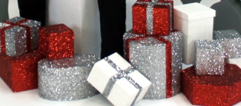 glittered polystyrene presents for window display